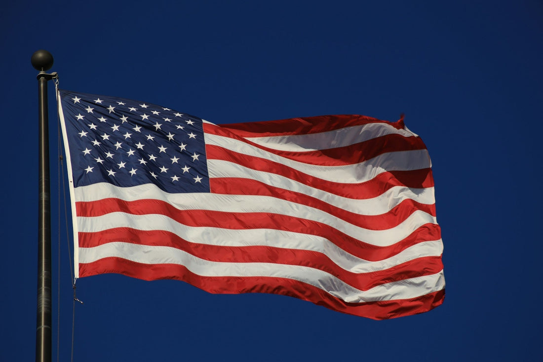 American flag flying proudly on a flagpole outdoors